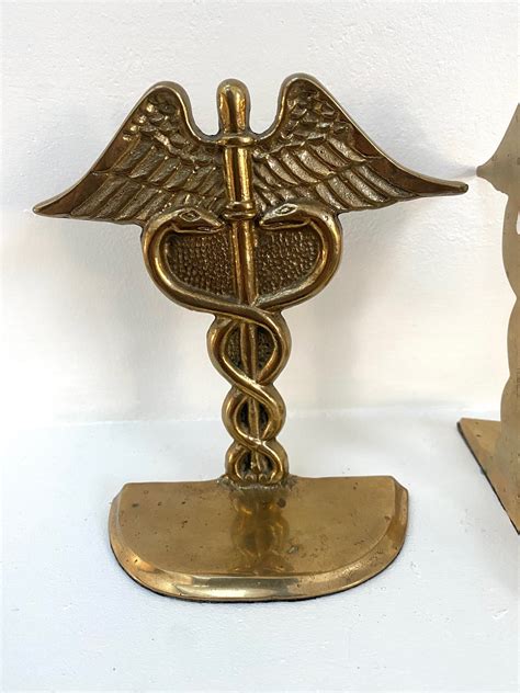 bookends hermes caduceus copper art deco|Bookends Caduceus .